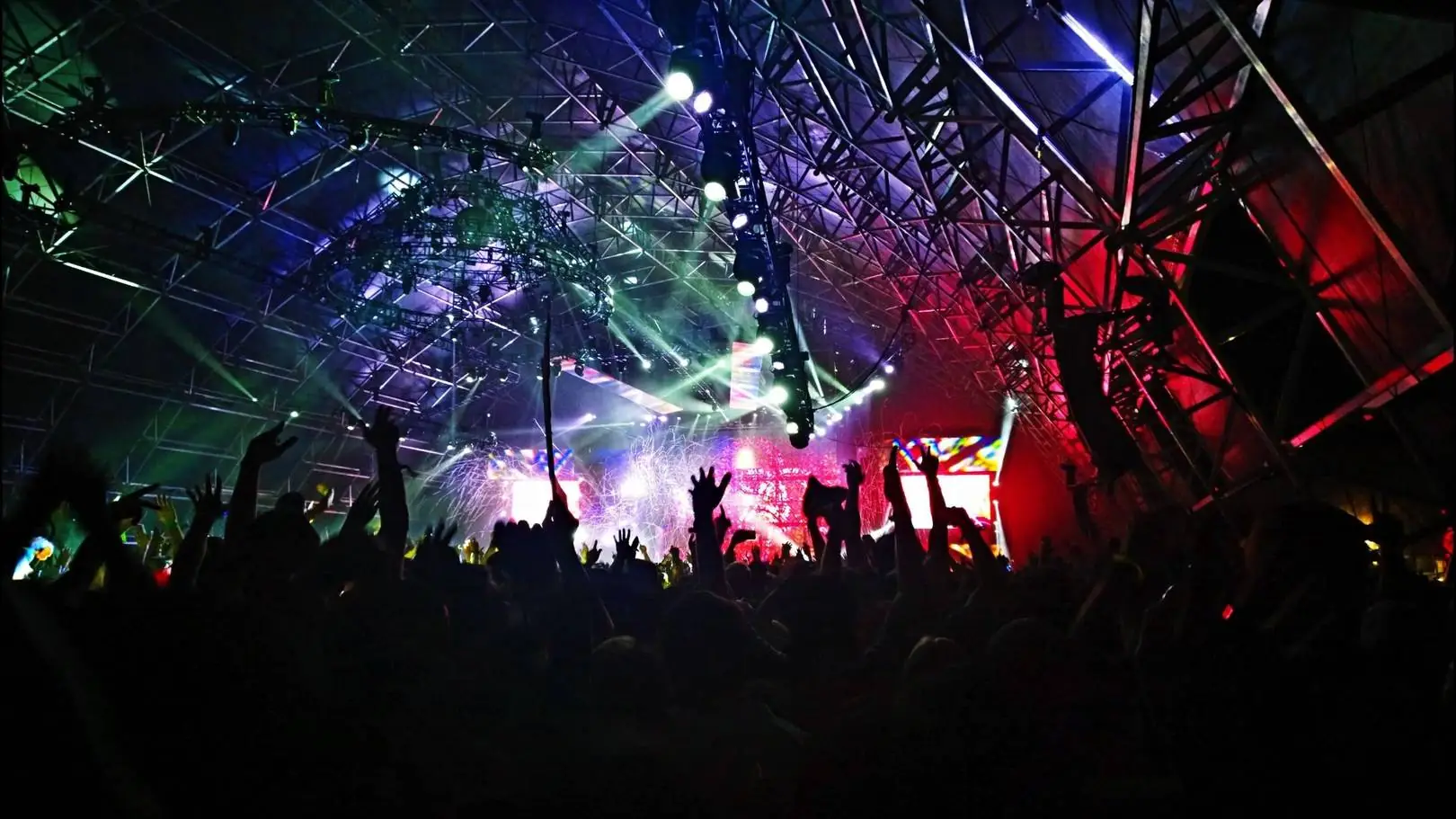 Festival crowd with hands raised
